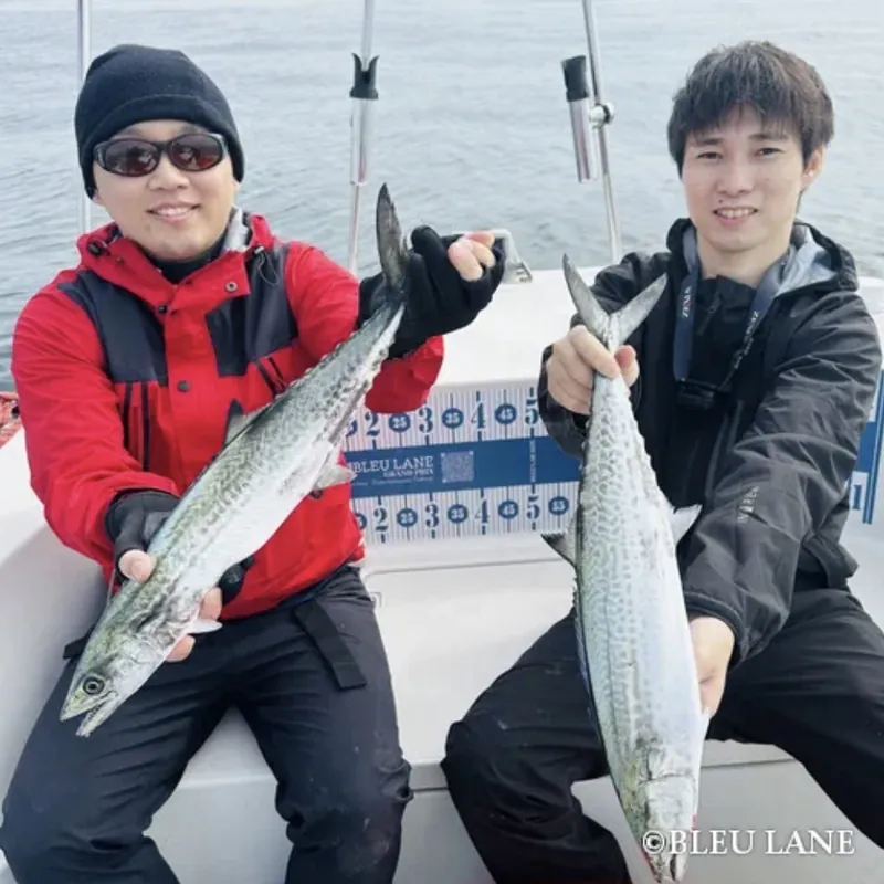 Two guests sharing their catch
