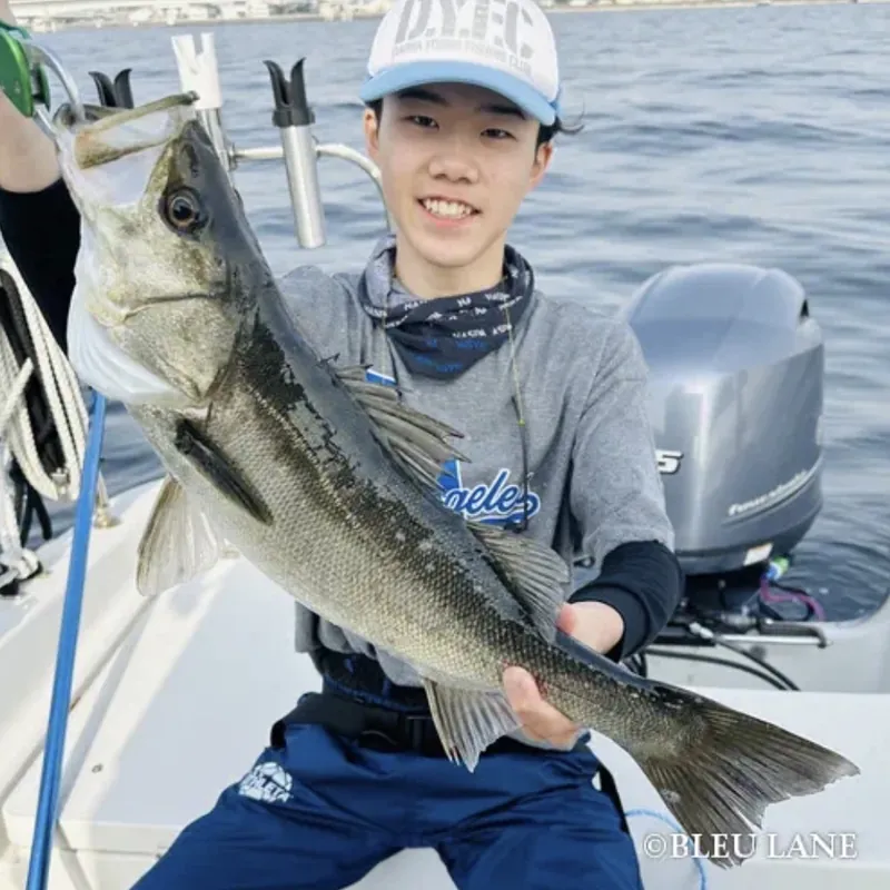 Guest proudly displaying a fish