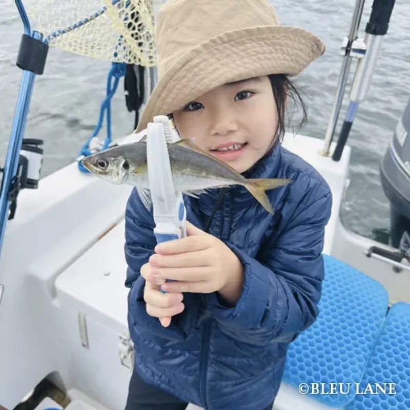 Young guest enjoying a fishing trip