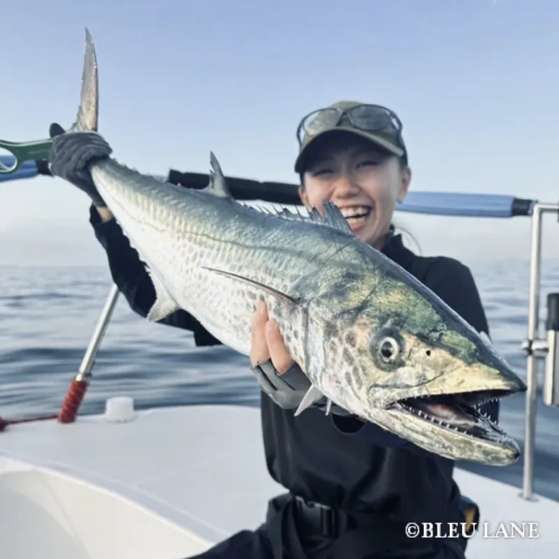 Guest celebrating a memorable catch on Tokyo Bay